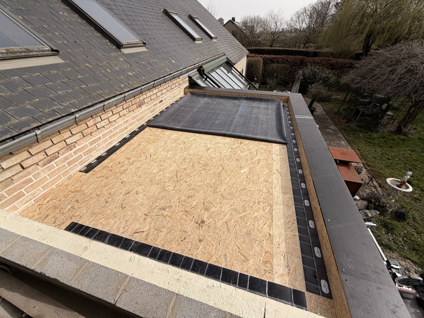 Coffrage OSB et début pose EPDM