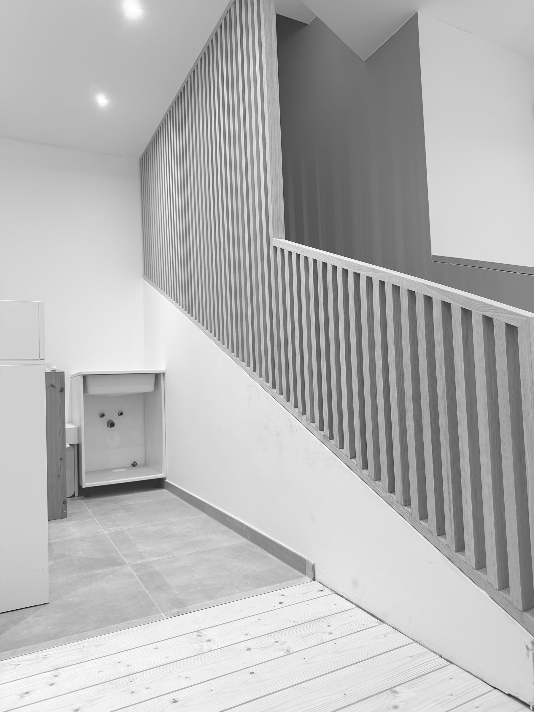 Vue bas — claustra finalisé côté palier