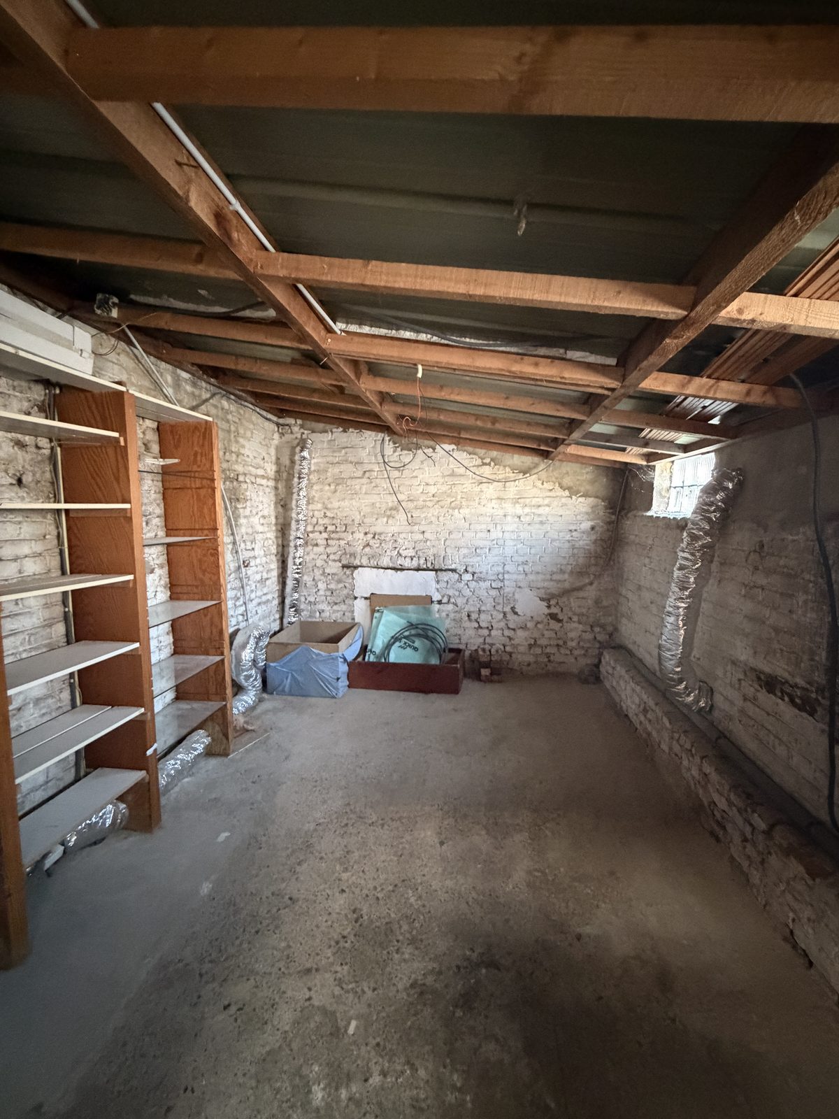 Démontage de la toiture existante entre les deux volumes