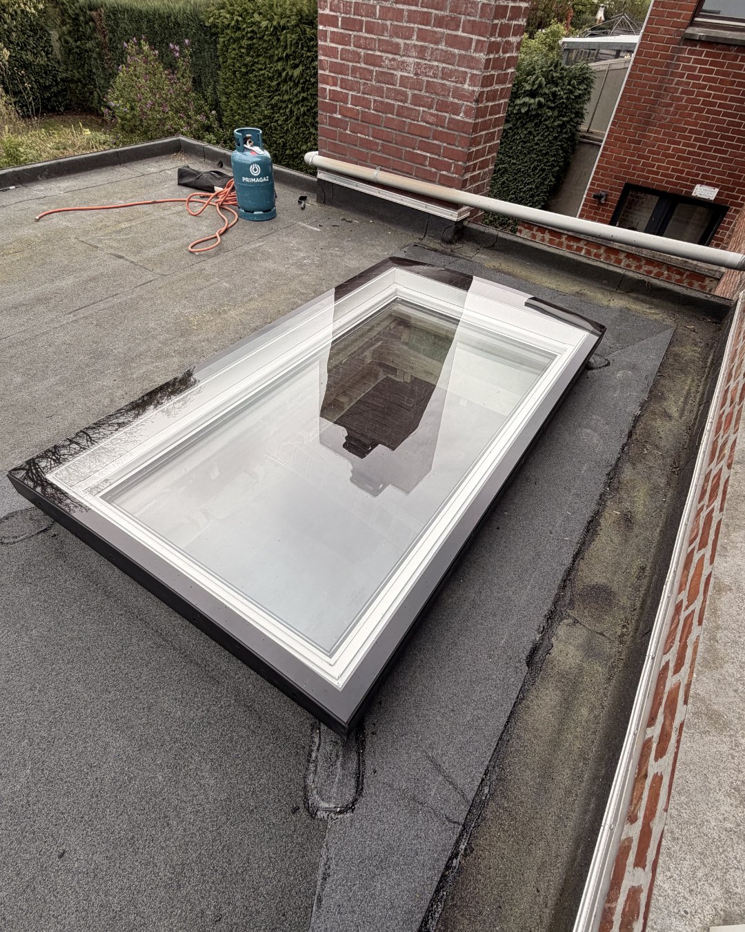 Velux toit plat 100x200 vitrage courbé SikHabitat Grivegnée